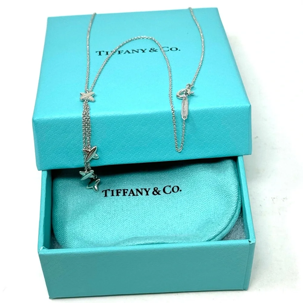Authentic Tiffany & co. Triple X Kiss Cross Drope Necklace.
